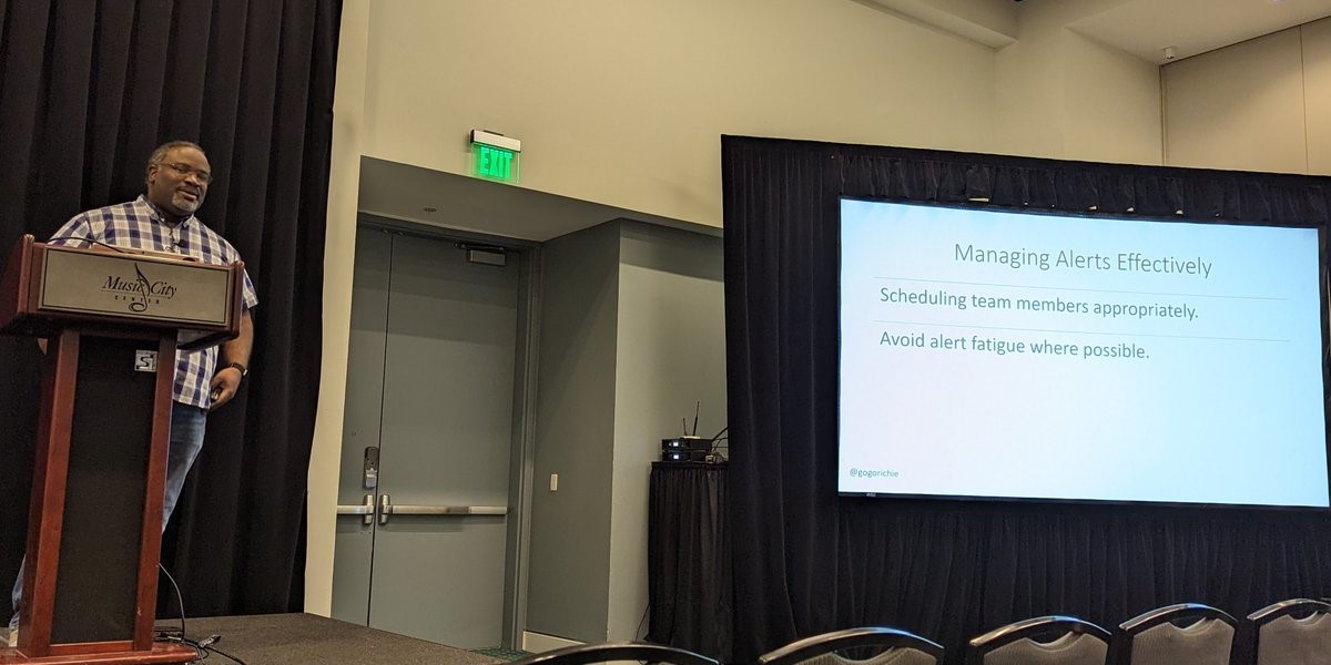 Richard Lewis presenting on alert management at DevOpsDays Nashville.